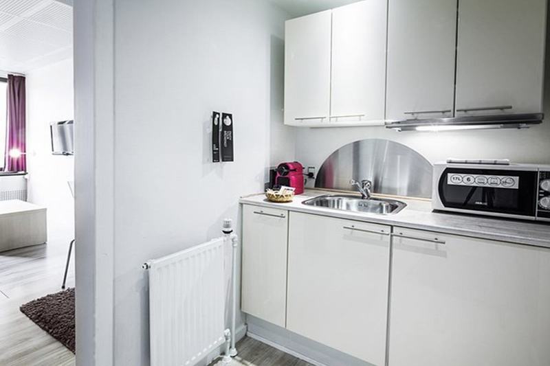 Manon Les Suites Guldsmeden Копенгаген Экстерьер фото A typical studio apartment kitchen
